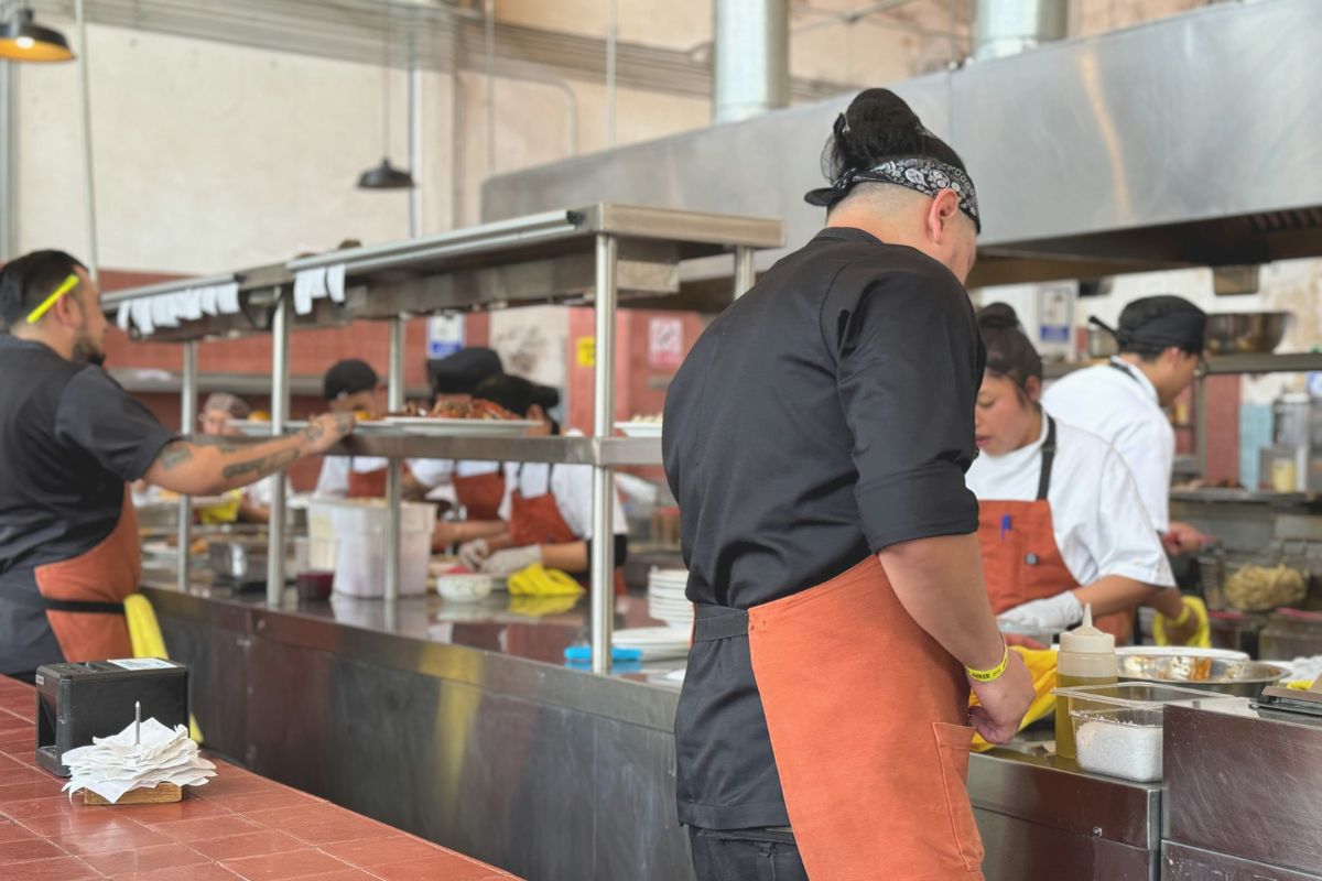 cooks cooking in restaurant